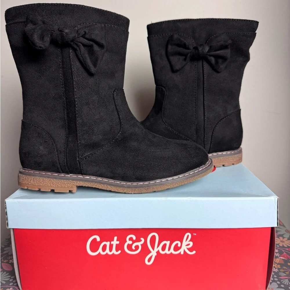 New in box girls black side zip boots with a bow